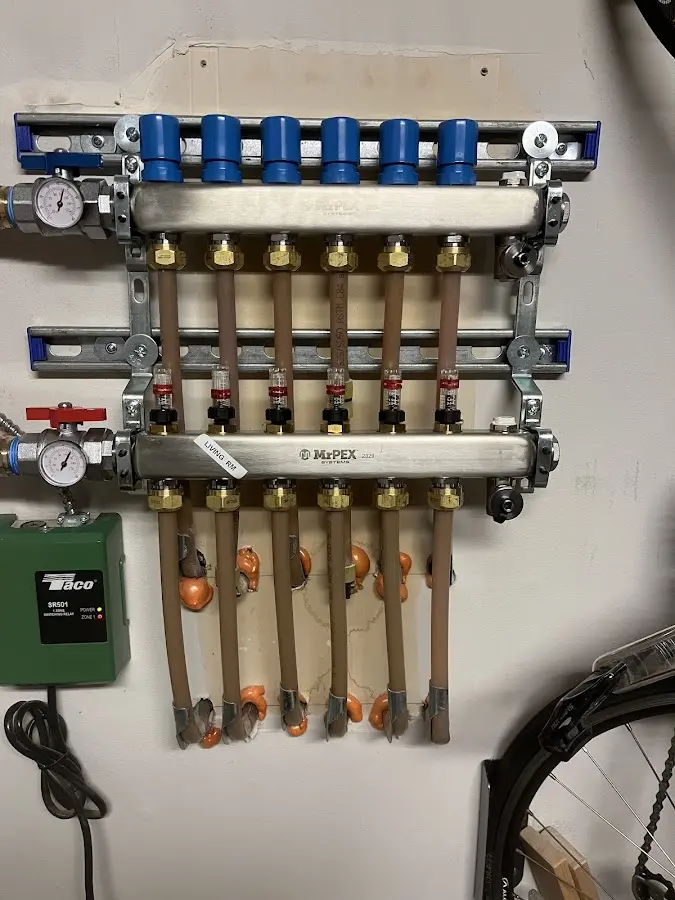 Plumber performing Water Heater Repair at a residential property in Teaneck